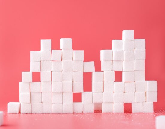 white sugar cube forming lines