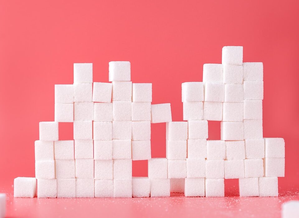 white sugar cube forming lines